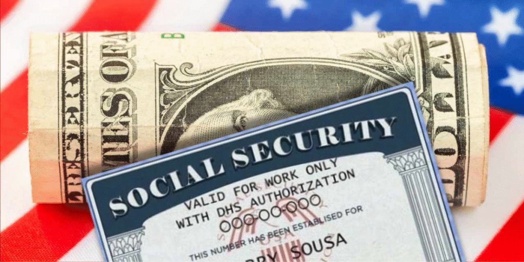 Social security card placed on American flag symbolizing SSI and social benefits in the USA